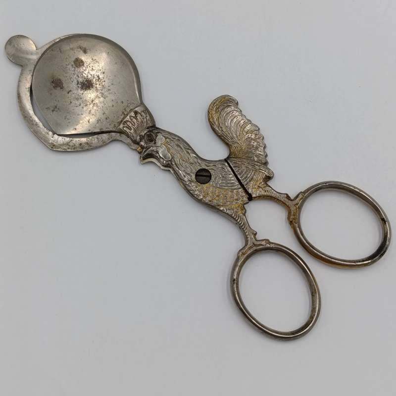 Vintage candle snuffer with rooster