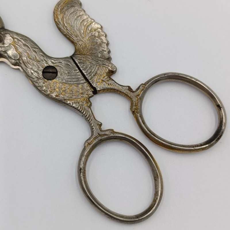 Vintage candle snuffer with rooster
