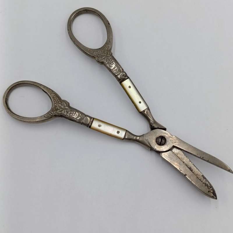 Vintage pair of grape scissors with mother of pearl inserts