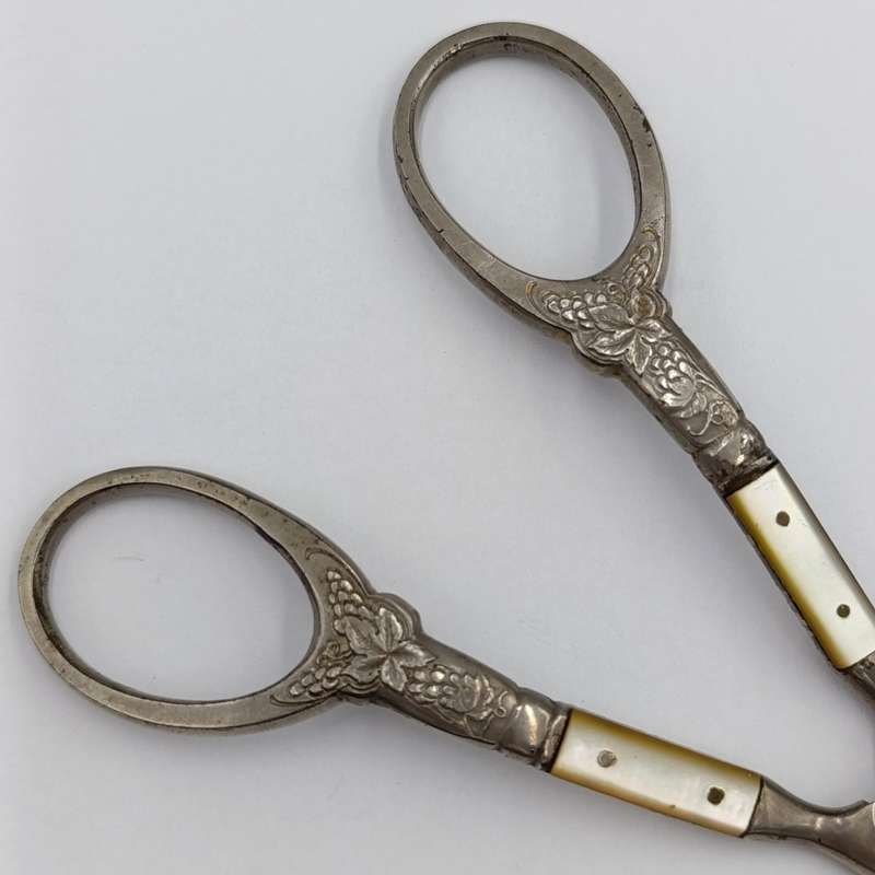 Vintage pair of grape scissors with mother of pearl inserts