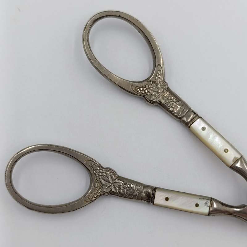 Vintage pair of grape scissors with mother of pearl inserts
