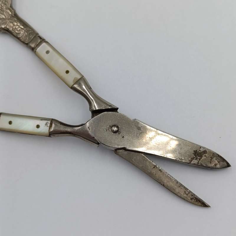 Vintage pair of grape scissors with mother of pearl inserts