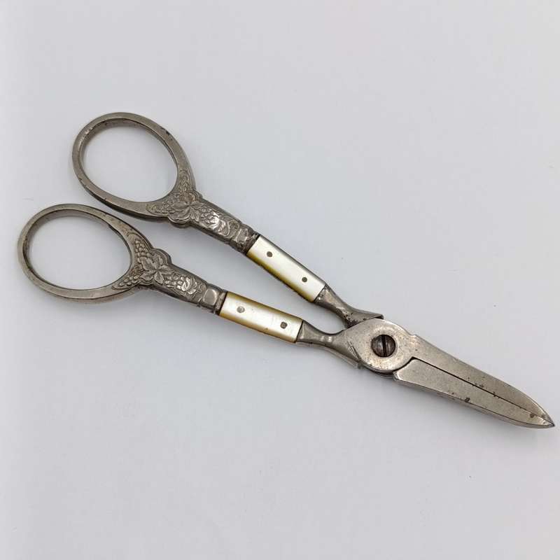 Vintage pair of grape scissors with mother of pearl inserts
