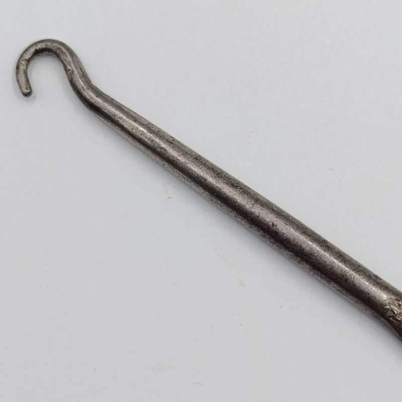Vintage Cuthberts shoelace puller