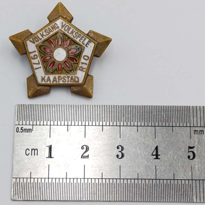 Pair of sterling silver Volkspele brooches plus R10 donation brooch