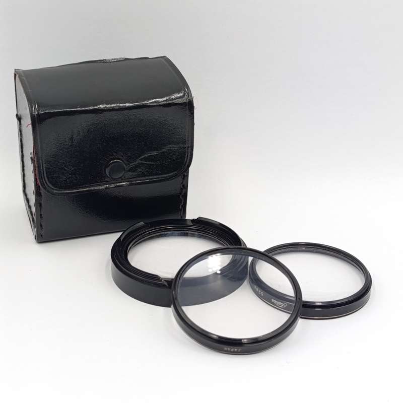 Nikkor and Toshiba lens covers / glare covers 52mm in leatherette box