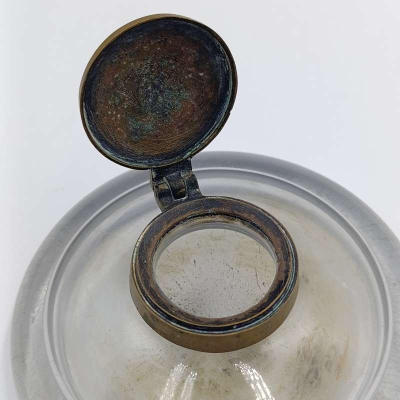 Antique lead glass inkwell with copper lid