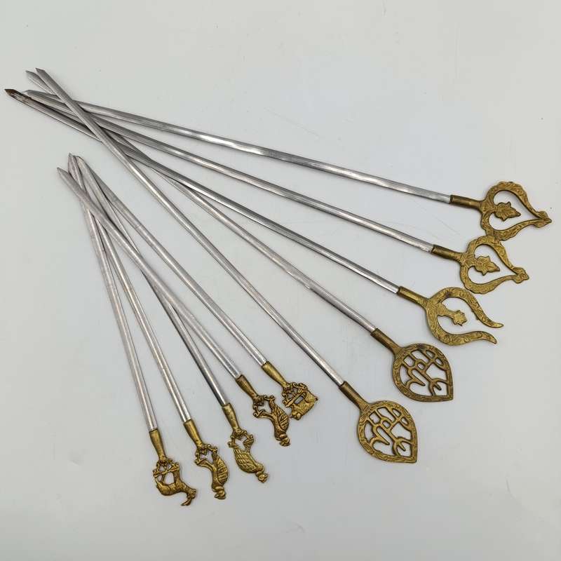 Lot of 10 vintage Turkish skewer sticks with brass tops