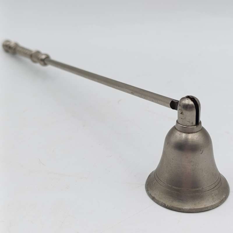 Vintage white brass candle snuffer
