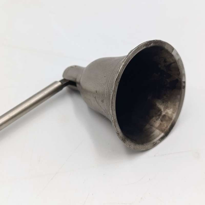 Vintage white brass candle snuffer