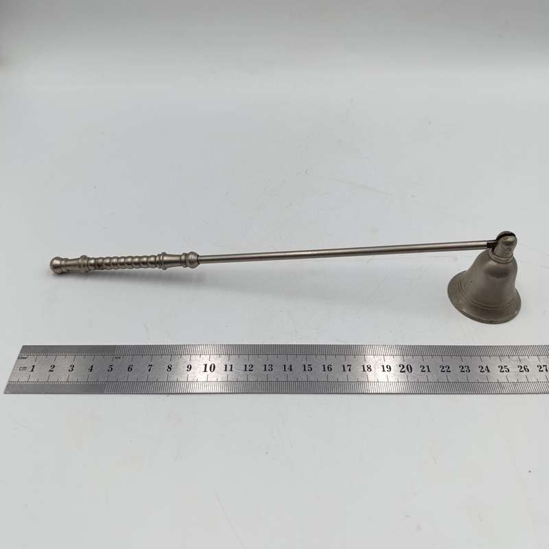 Vintage white brass candle snuffer