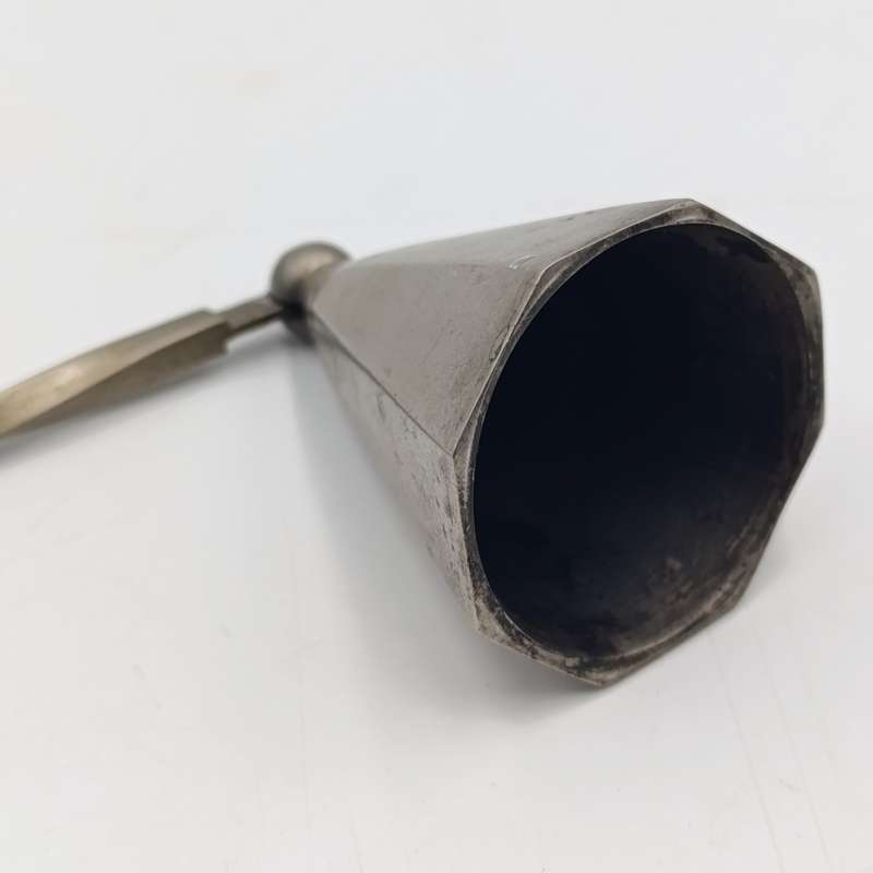 Vintage white brass candle snuffer