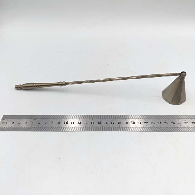 Vintage white brass candle snuffer