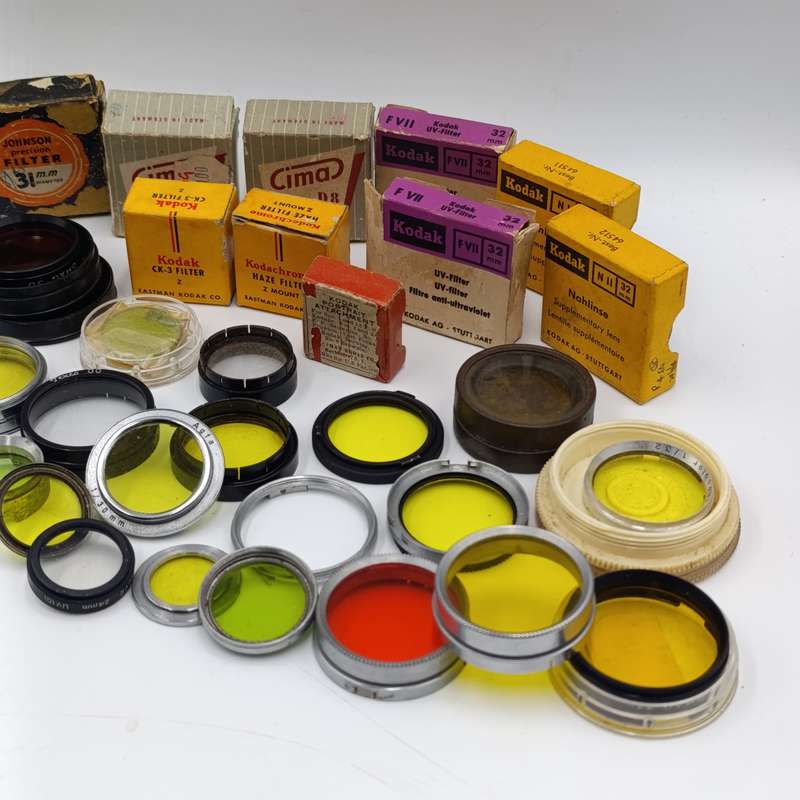 Large lot of vintage camera lens filters