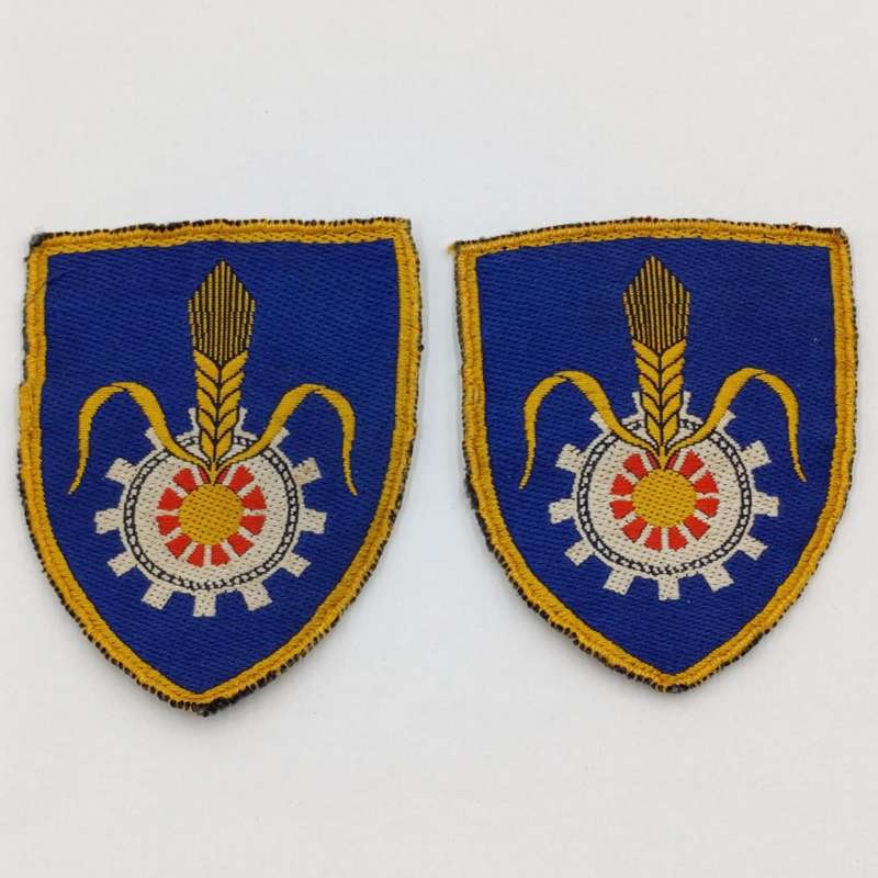 Pair of SADF Quartermaster General cloth shoulder flashes
