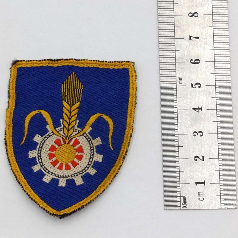 Pair of SADF Quartermaster General cloth shoulder flashes