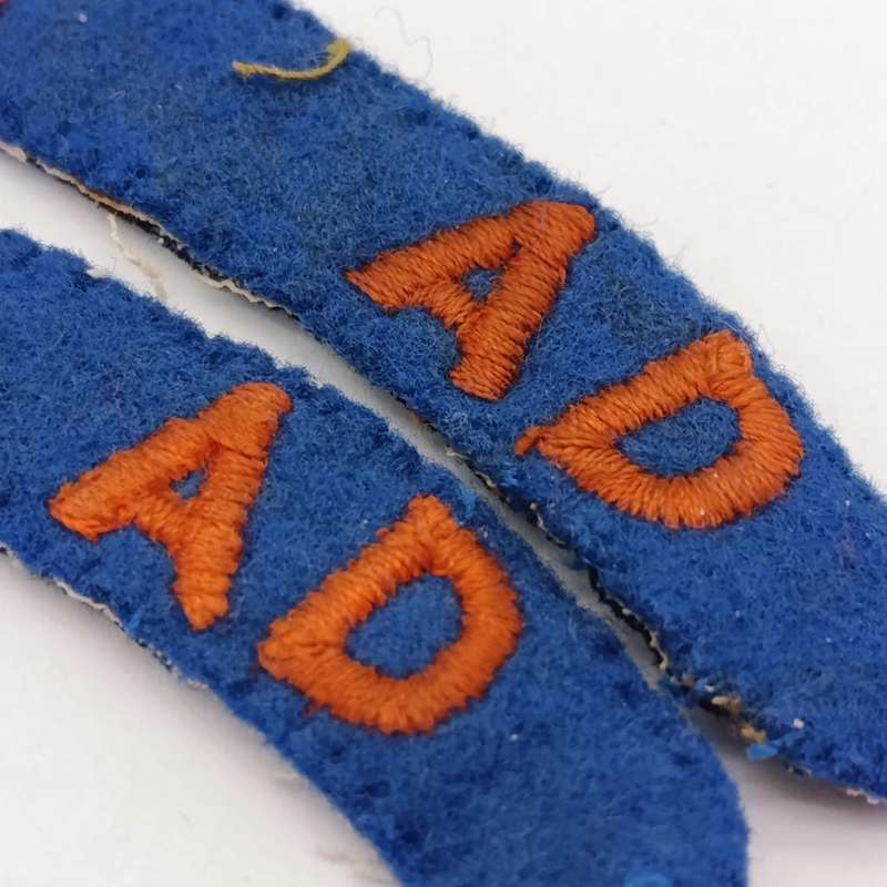 Pair of SADF 95 Ammunition Depot cloth shoulder titles