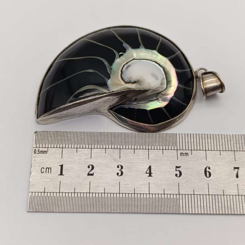 Vintage Nuutitles Shell in sterling silver pendant