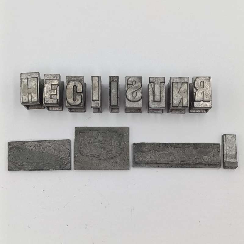 Lot of 13 metal letter and shape press block