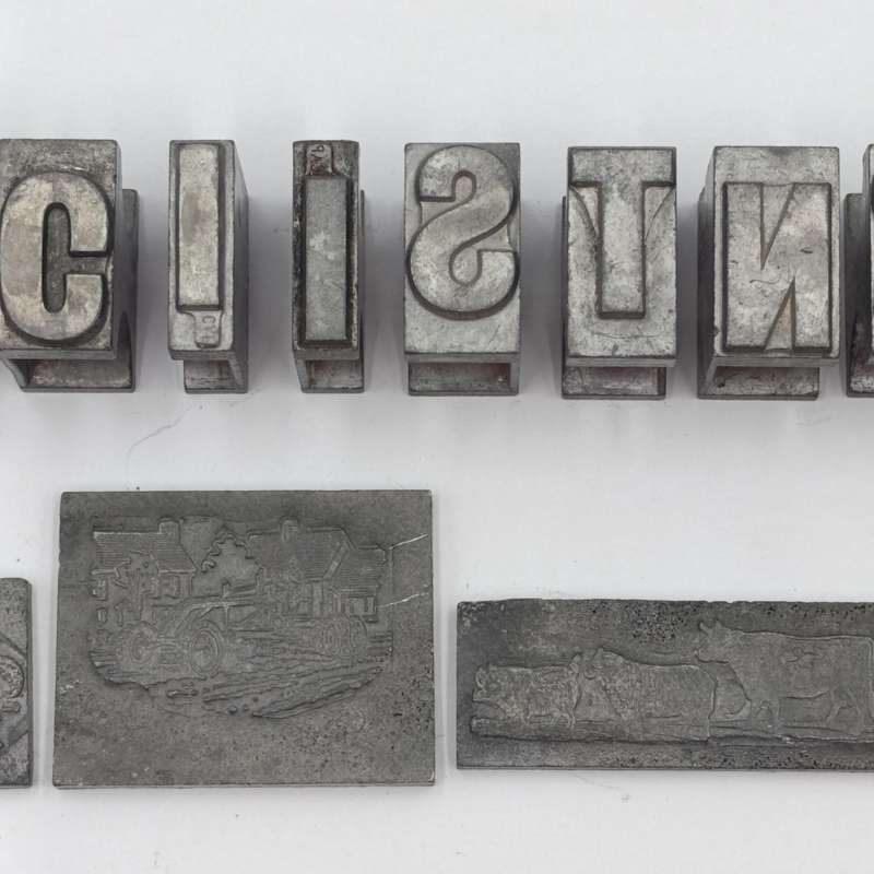 Lot of 13 metal letter and shape press block