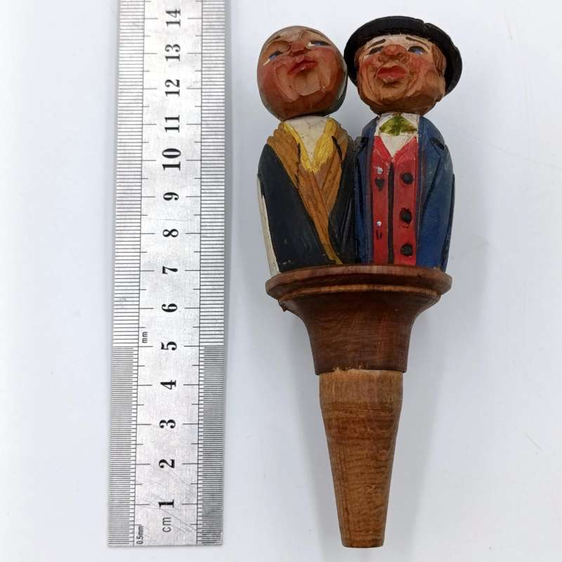 Vintage wooden carved mechanical wine stopper