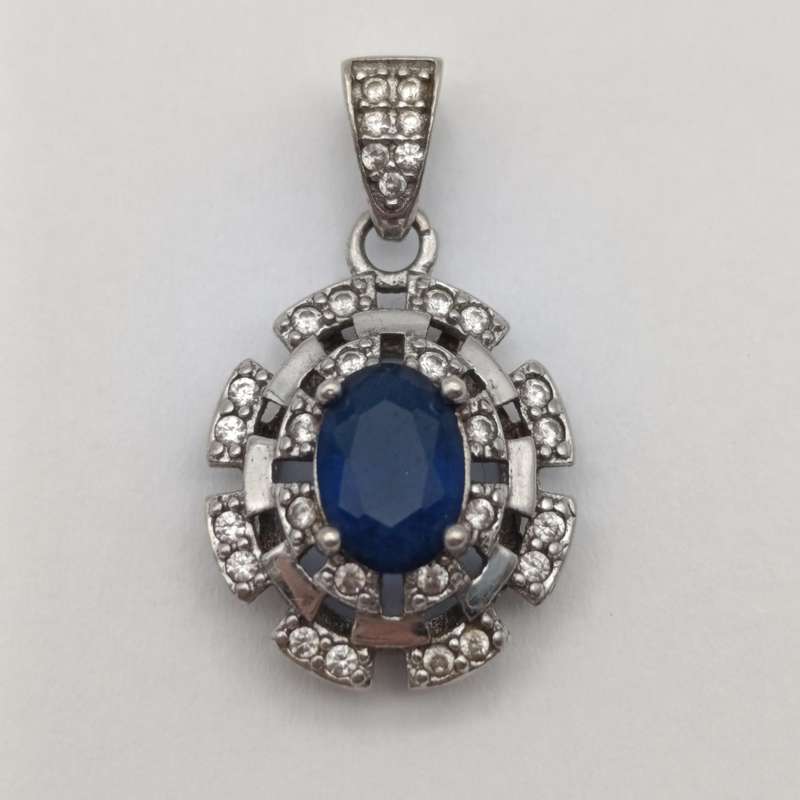 Sterling silver pendant with blue and clear stones - weighs 1.7g