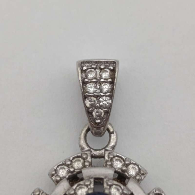 Sterling silver pendant with blue and clear stones - weighs 1.7g
