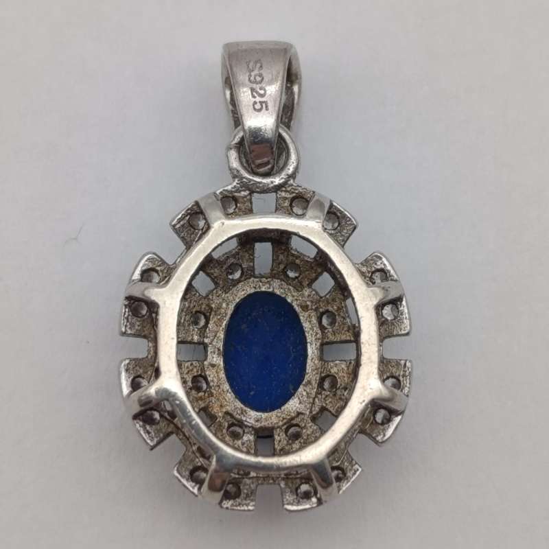 Sterling silver pendant with blue and clear stones - weighs 1.7g