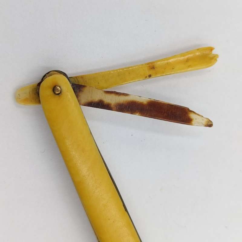 Antique small pocket knife with snuff spoon and picks