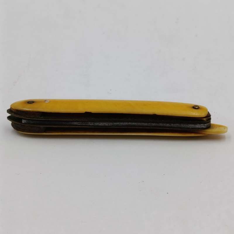Antique small pocket knife with snuff spoon and picks