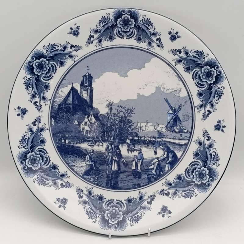 Vintage Delft Sunday winter scene on the frozen Delft canal porcelain plate