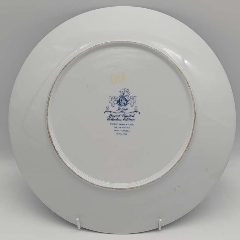 Vintage Delft Sunday winter scene on the frozen Delft canal porcelain plate