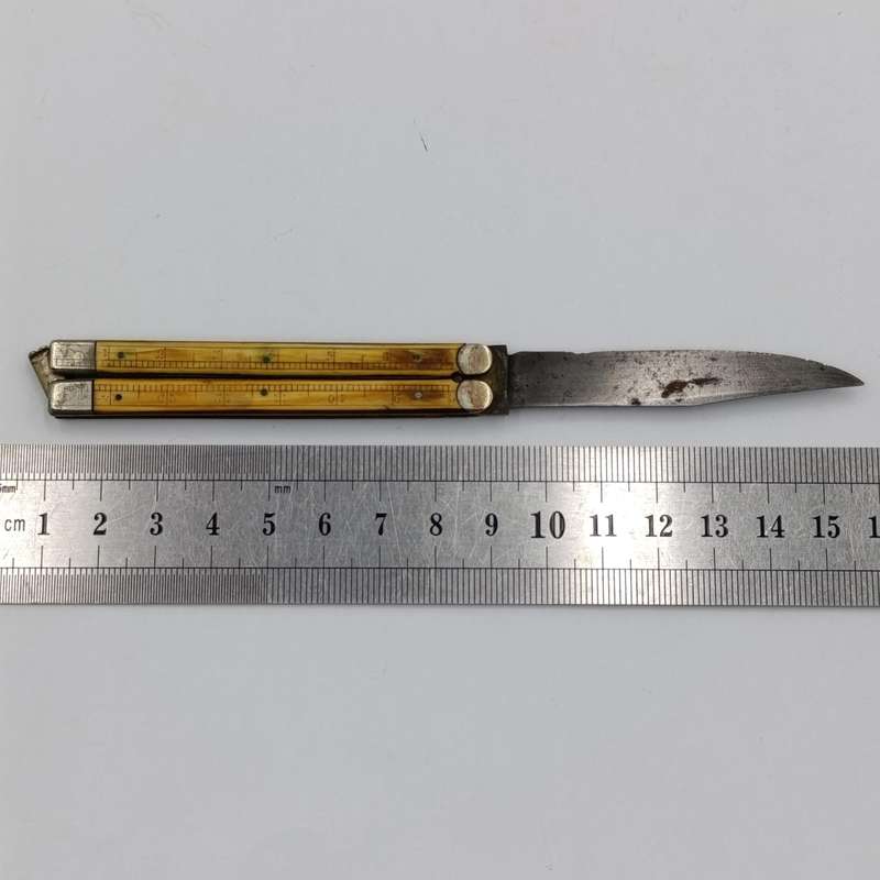 Vintage butterfly knife with bone handles with ruler measurements