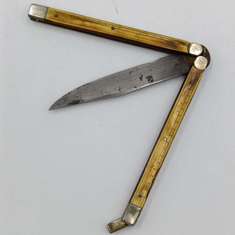 Vintage butterfly knife with bone handles with ruler measurements