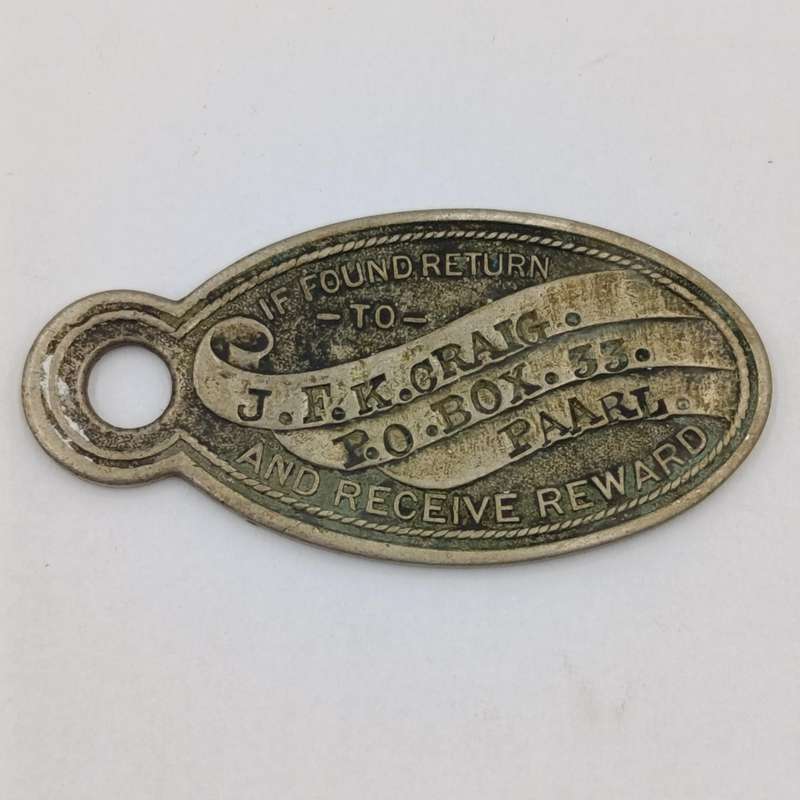 Vintage "If found return to" keyring tag