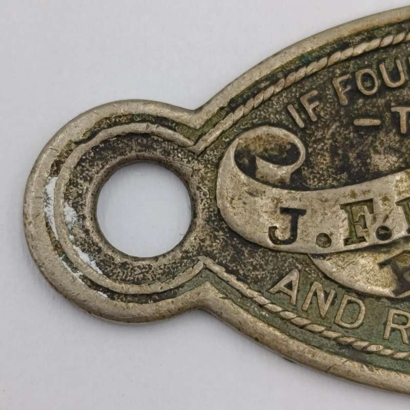 Vintage "If found return to" keyring tag