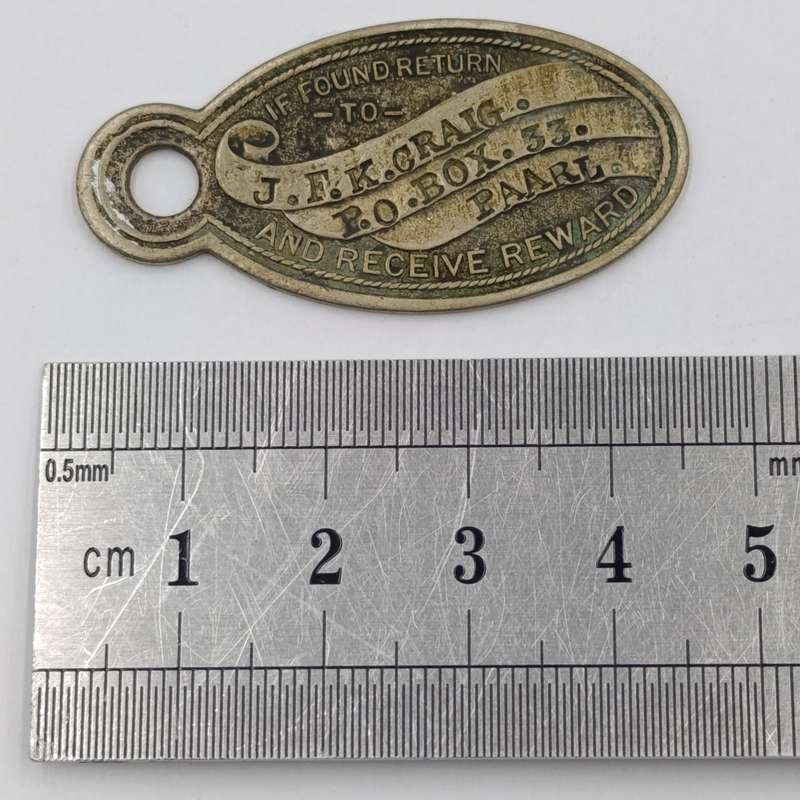 Vintage "If found return to" keyring tag