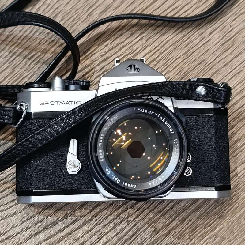 Vintage Pentax Spotmatic 35mm film camera with extra lenses and accessories in camera case