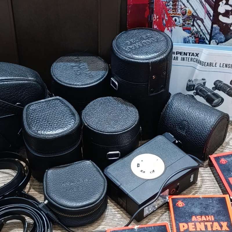 Vintage Pentax Spotmatic 35mm film camera with extra lenses and accessories in camera case