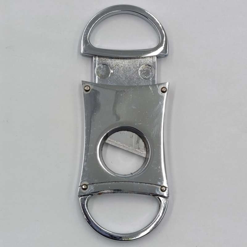 Vintage Sheffield England cigar cutter in pouch