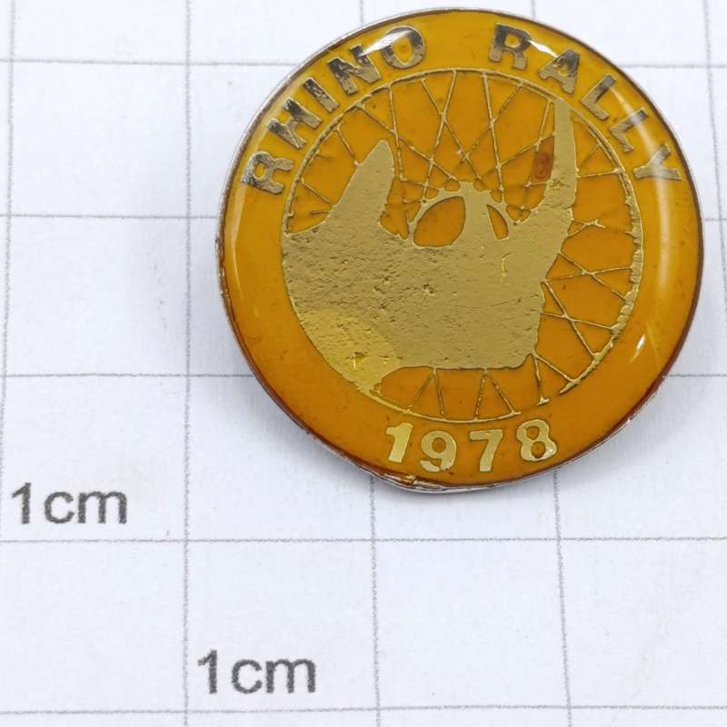 Pair of Rhino Rally 1978  metal brooch badges