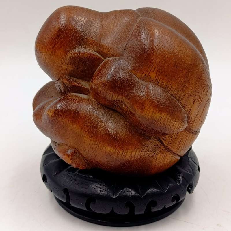 Handcarved wooden weeping buddha sculpture