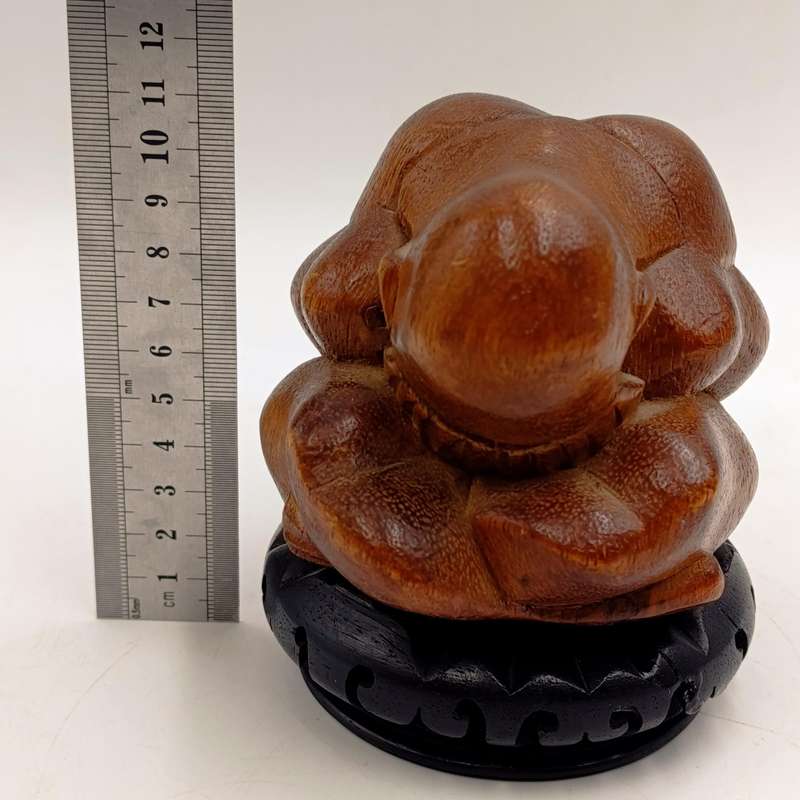 Handcarved wooden weeping buddha sculpture