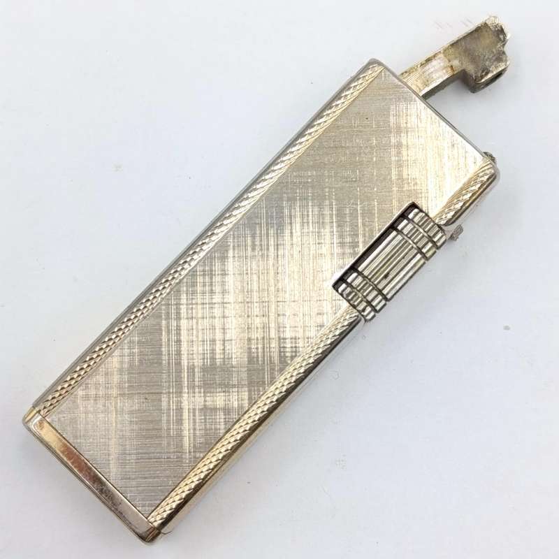 Vintage Ruslite pocket lighter - working