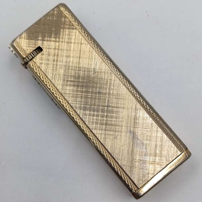 Vintage Ruslite pocket lighter - working