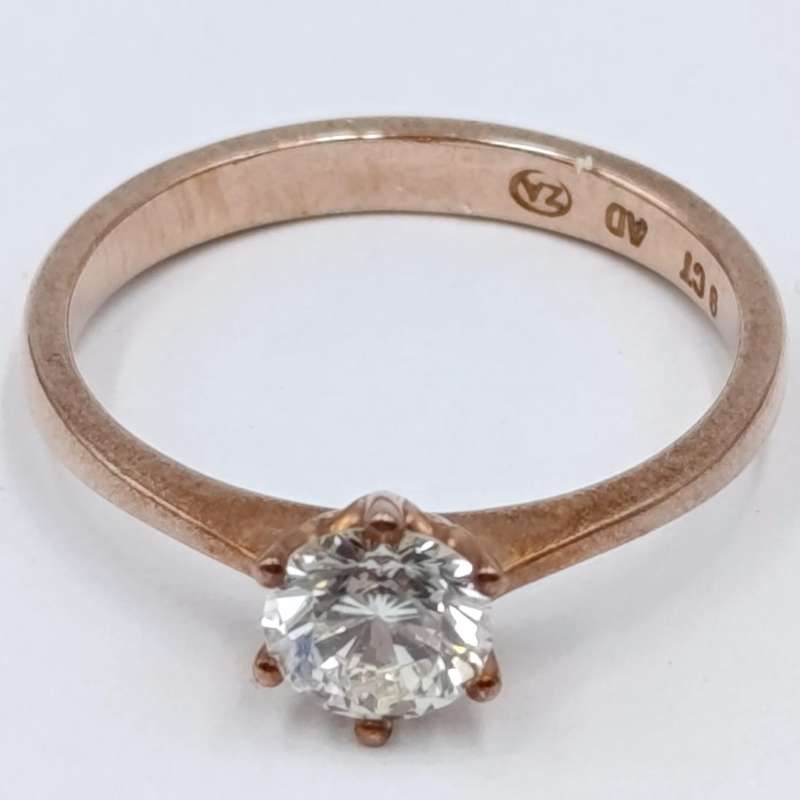 9Kt Rose Gold diamond ring with appr. 0,70ct round diamond - weighs 2,0 grams - size M