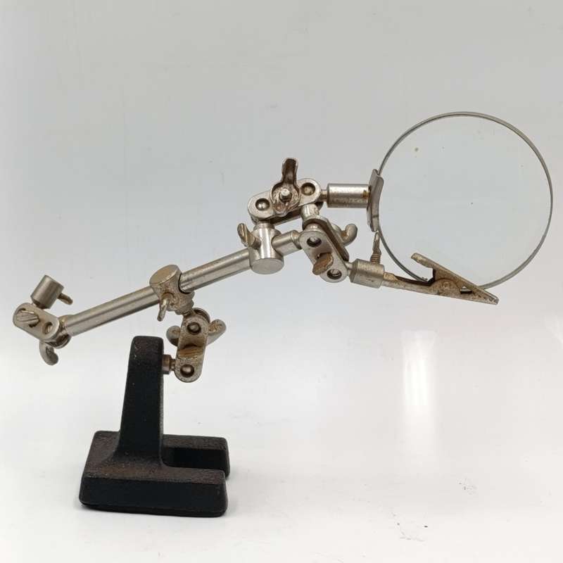 Vintage hobby clamps with magnifying glass