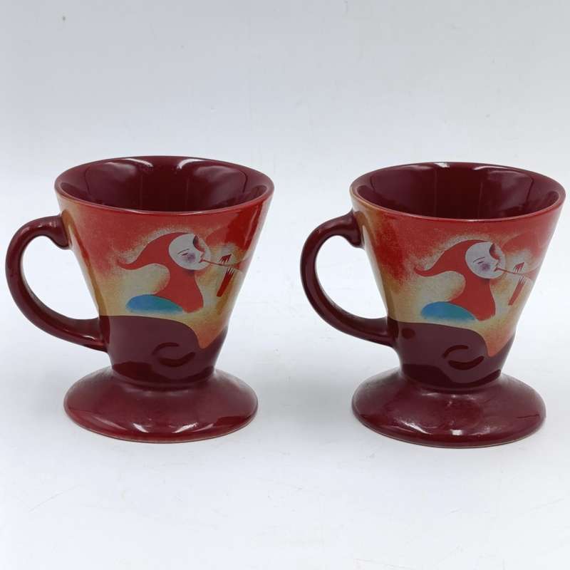 Pair of signed Linda Frichtel Jester coffee cups