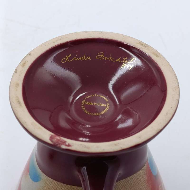 Pair of signed Linda Frichtel Jester coffee cups