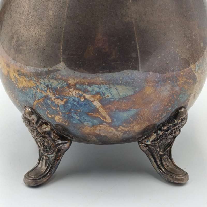Antique silverplated pitcher with ice stopper